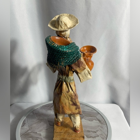 Handcrafted Artisan Figurine with Orange and Green Accents - Picture 9 of 14
